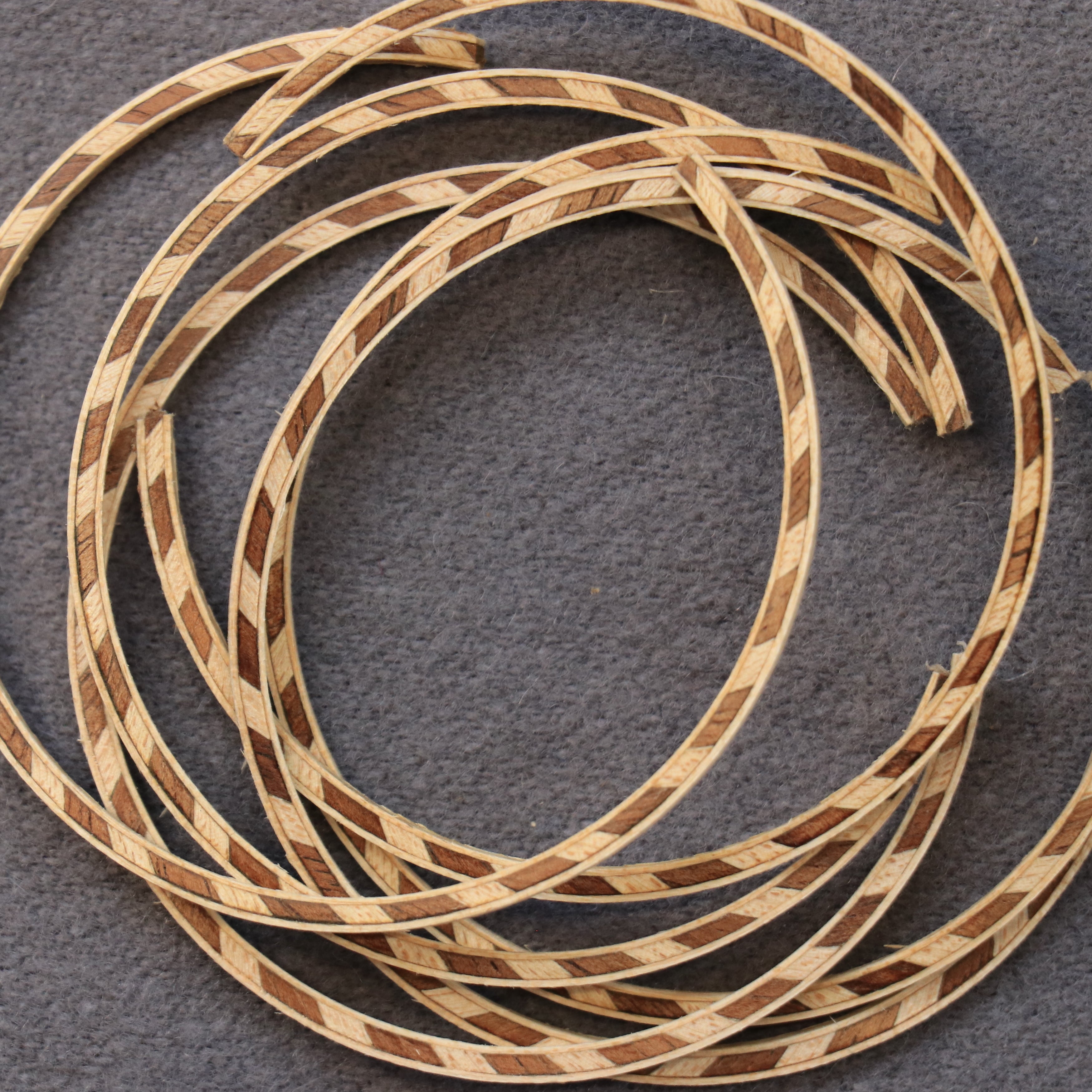 Koa/Maple rope rosette – Gurian Instruments